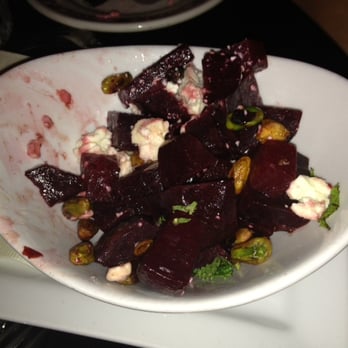 Wilde Bar & Restaurant - Beet appetizer with goat cheese, mint, and pistachios. - Pubs Near Me - Chicago, Illinois Wilde Bar & Restaurant - Beet appetizer with goat cheese, mint, and pistachios. - Pubs Near Me - Chicago, Illinois