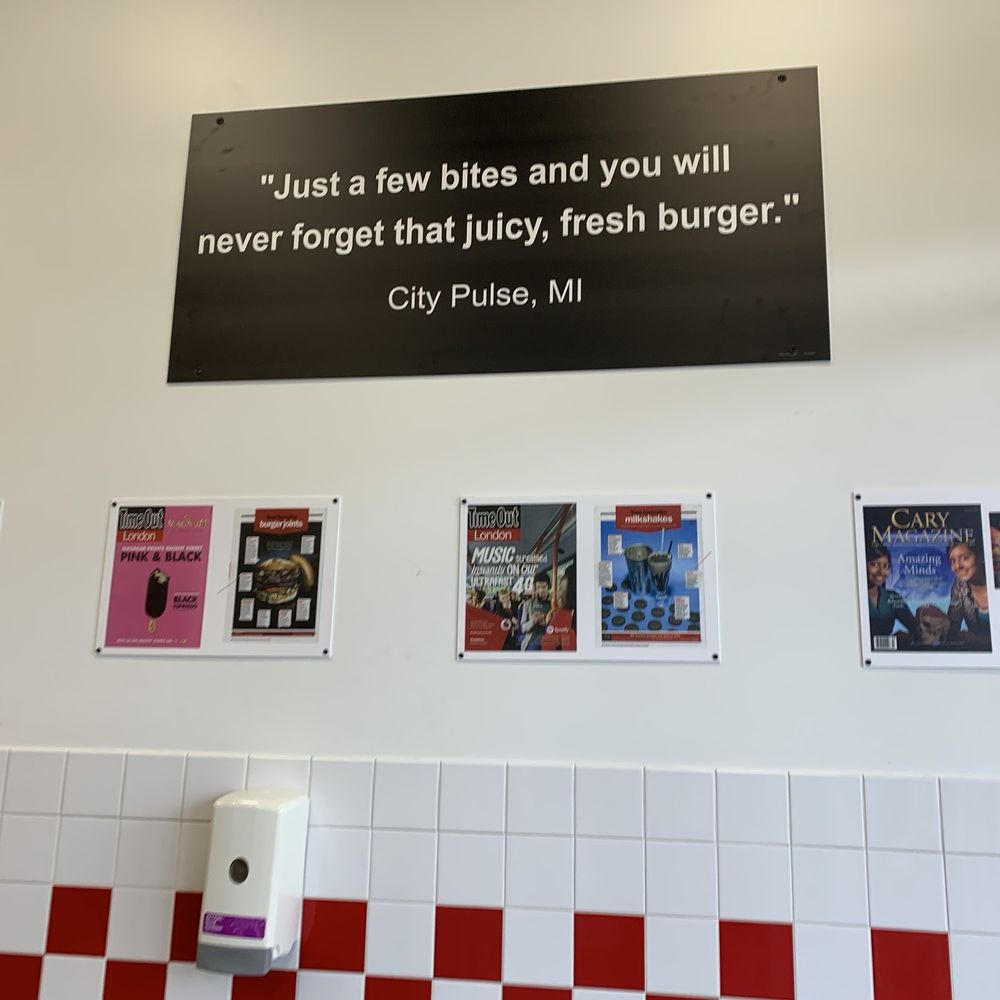 Five Guys - a sign on the wall of a restaurant - Burgers Near Me - St. Joseph, Michigan