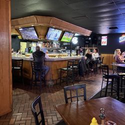 Sandys Sports Bar and Restaurant - So glad we got here before the playoffs began. I get to pick any comfy seat at the horseshoe bar or available ones in the huge dining area.