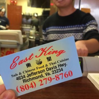 East King - a man sitting at a table with a business card in front of him - Chinese Near Me - Richmond, Virginia East King - a man sitting at a table with a business card in front of him - Chinese Near Me - Richmond, Virginia