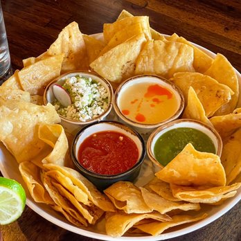Pink Cactus - Appetizer Trio - two salsas, queso and guacamole along with freshly made homemade chips - Tacos Near Me - Charleston, South Carolina