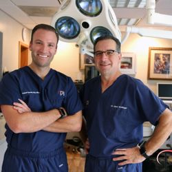Pi Dental Center - Board-Certified Prosthodontists, Dr. Robert Slauch (left) and Dr. Glenn Wolfinger (right)