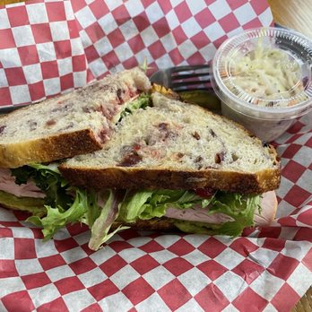 Main Street Bagels - Turkey/cranberry sandwich with side of cole slaw - Bagels Near Me - Grand Junction, Colorado Main Street Bagels - Turkey/cranberry sandwich with side of cole slaw - Bagels Near Me - Grand Junction, Colorado