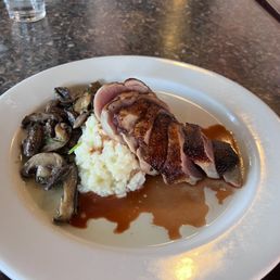 House brined duck breast with mushrooms and risotto House brined duck breast with mushrooms and risotto
