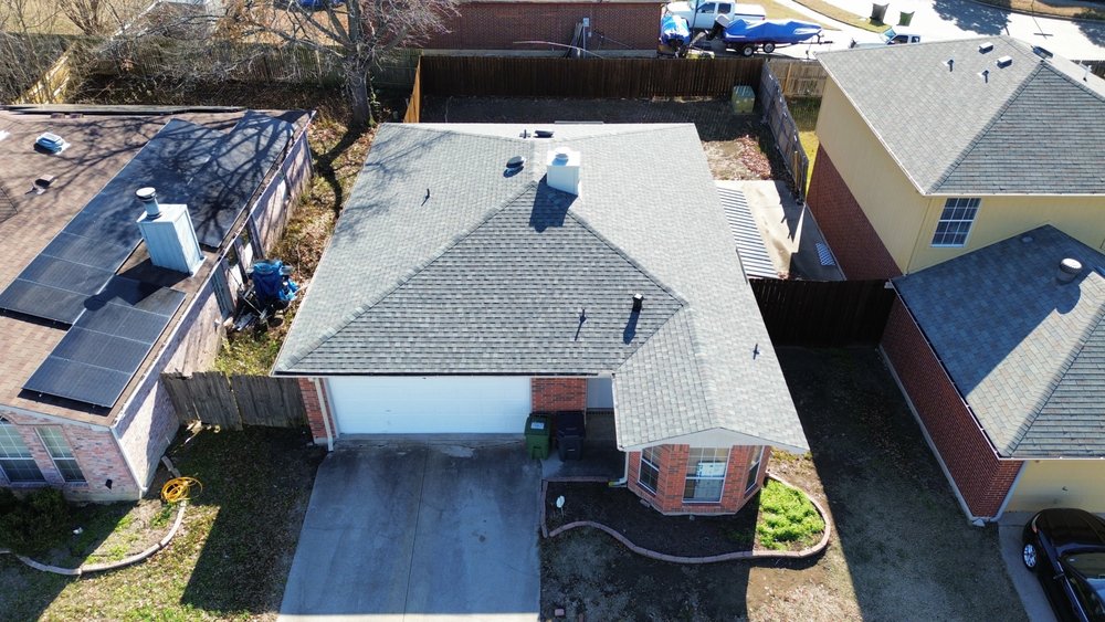 Slide of Uptown Roofing & Co