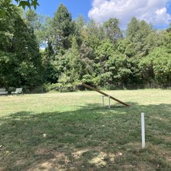 West Windsor Community Dog Park - Benches for people and agility and balance elements for dogs.