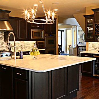 Euro Granite and Stone - a kitchen with a center island - Countertop Installation Near Me - Boynton Beach, Florida Euro Granite and Stone - a kitchen with a center island - Countertop Installation Near Me - Boynton Beach, Florida