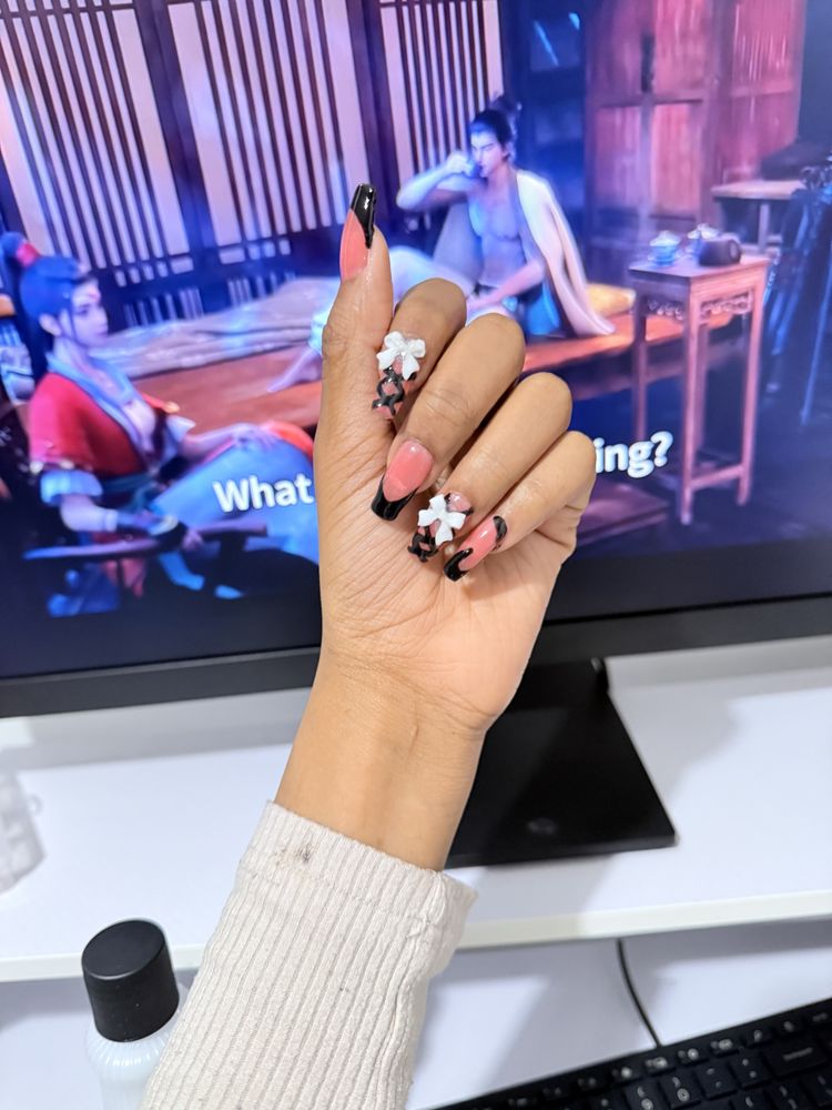Nail Salon & More Logo