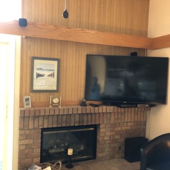 Jeff Denison - Original wall & fireplace before painting. - Carpenters Near Me