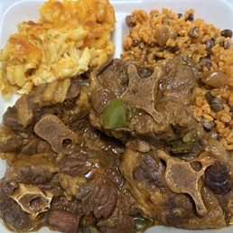 Oxtail, rice with gandules, mac and cheese