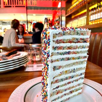 Maison Pickle - 24 Layer Vanilla Confetti Cake - Cocktail Bars Near Me - New York, New York Maison Pickle - 24 Layer Vanilla Confetti Cake - Cocktail Bars Near Me - New York, New York