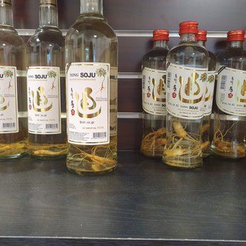Zion Liquor - a row of bottles of liquor - Beer, Wine & Spirits Near Me Zion Liquor - a row of bottles of liquor - Beer, Wine & Spirits Near Me
