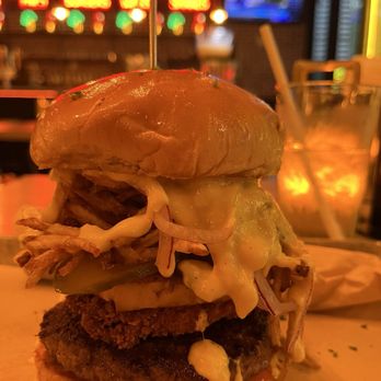 Burgermeister - Brickell - Pineapple sauce, pineapple, fried cheese, potato sticks, pickles and red onion burger - Burgers Near Me - Miami, Florida