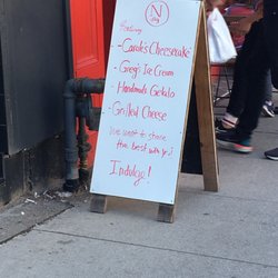 Indulge Desserts & Caroles Cheesecake Counter - Outside sign