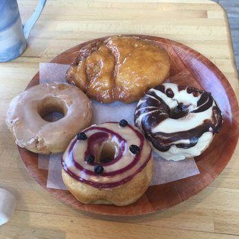 Vortex Doughnuts - Four vegan doughnuts (fritter, pineapple chocolate, peach and blueberry)  Also had the Nicaraguan and Ethiopian coffee - Coffee & Tea Near Me - Asheville, North Carolina