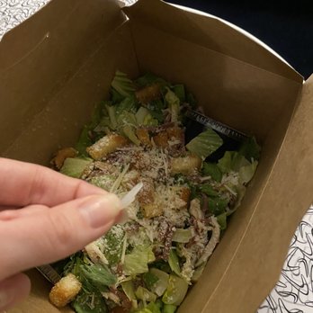 402 eat + drink - Caesar salad topped with plastic. - American Near Me - Omaha, Nebraska