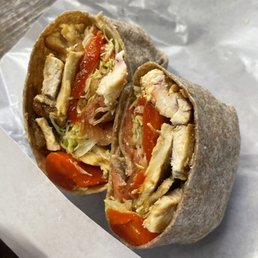 Grilled chicken, roasted red peppers, lettuce, tomatoes, on a whole wheat wrap Grilled chicken, roasted red peppers, lettuce, tomatoes, on a whole wheat wrap