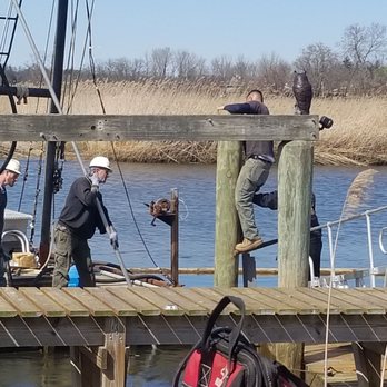 Rice Associates - a group of people on a dock - General Contractors Near Me - Fair Haven, New Jersey Rice Associates - a group of people on a dock - General Contractors Near Me - Fair Haven, New Jersey