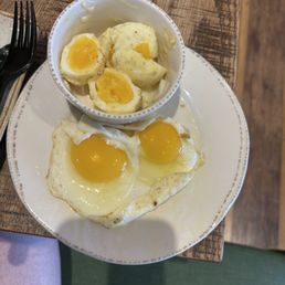Pictured is the overcooked "poached" eggs and the underdone sunny side up eggs.