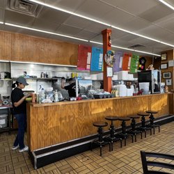 Tacos Los Plebes - View of the kitchen area.