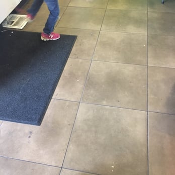 Baja Fresh - Unswept floor. I'm not even that irritated about floors. More the tables and salsa bar. - Mexican Near Me - Folsom, California