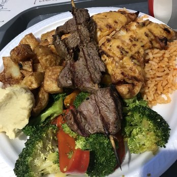 Grillades Torino - a plate of food on a tray - Barbeque Near Me - Montreal, Quebec Grillades Torino - a plate of food on a tray - Barbeque Near Me - Montreal, Quebec