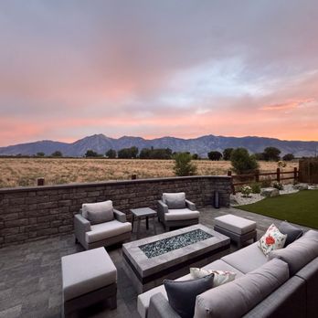 Tom Ediss Landscape - The new patio is highlighted by a big custom firepit and a beautiful wind wall. The amazing crew had to shape blocks to make the turns. - Landscaping Near Me - Carson City, Nevada Tom Ediss Landscape - The new patio is highlighted by a big custom firepit and a beautiful wind wall. The amazing crew had to shape blocks to make the turns. - Landscaping Near Me - Carson City, Nevada