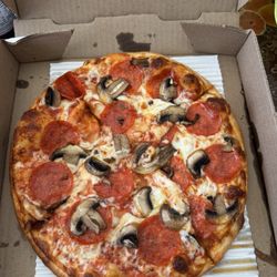 Mik's Pizza - 10 inch - Pepperoni and mushroom pizza. 4/15/26 Price with Taxes: $14.74