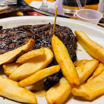 Texas Roadhouse - a plate of steak and french fries - Barbeque Near Me - Denver, Colorado Texas Roadhouse - a plate of steak and french fries - Barbeque Near Me - Denver, Colorado
