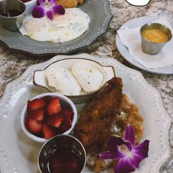 Harvest Kitchen & Bakery - Chicken and Belgian Waffles with poached eggs and a side of hollandaise sauce! - Breakfast & Brunch Near Me - Katy, Texas Harvest Kitchen & Bakery - Chicken and Belgian Waffles with poached eggs and a side of hollandaise sauce! - Breakfast & Brunch Near Me - Katy, Texas