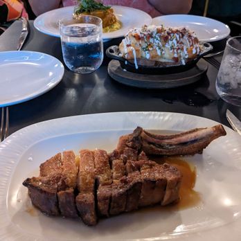 Cino - Pork chop, twice baked potato - Italian Near Me - Honolulu, Hawaii Cino - Pork chop, twice baked potato - Italian Near Me - Honolulu, Hawaii