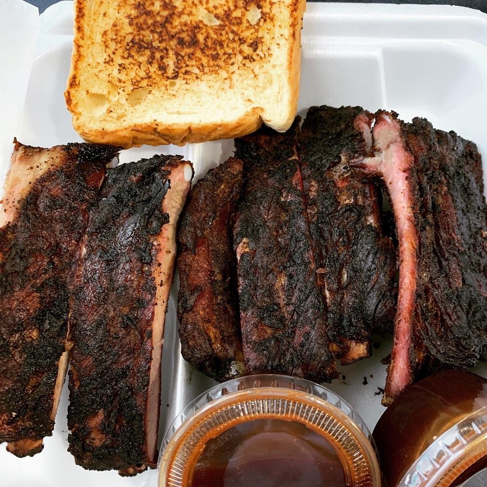 Sylvester's Ms Style BBQ - Half slab comes w slice of bread and bbq sauce (dark, caramel, molasses). You can taste the clean earth with every juicy bite. - American Near Me - Raymond, Mississippi Sylvester's Ms Style BBQ - Half slab comes w slice of bread and bbq sauce (dark, caramel, molasses). You can taste the clean earth with every juicy bite. - American Near Me - Raymond, Mississippi