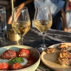 Meatballs and burrata and clams