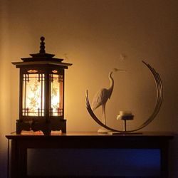 White Crane Wellness - Warm up in the studio with low lights and table that beckons you to relax