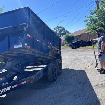 Twin Peak Services - Our 10 yard commercial dump trailer, unloading 2 yards of 1/2 inch road base to fill in a customer's private driveway - Junk Removal & Hauling Near Me Twin Peak Services - Our 10 yard commercial dump trailer, unloading 2 yards of 1/2 inch road base to fill in a customer's private driveway - Junk Removal & Hauling Near Me