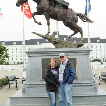 World Equestrian Center - Keri & Glen by the statue and plaque for Reckless - Stadiums & Arenas Near Me - Ocala, Florida