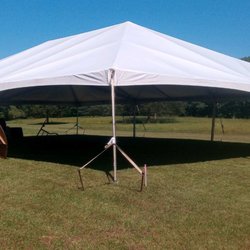 Party Time Rental and Events - 40x60 kedered tent being set up for a wedding