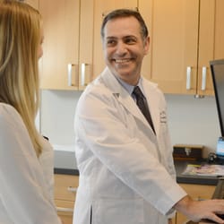 Alfred Sofer, MD - Alfred Sofer, MD with a patient