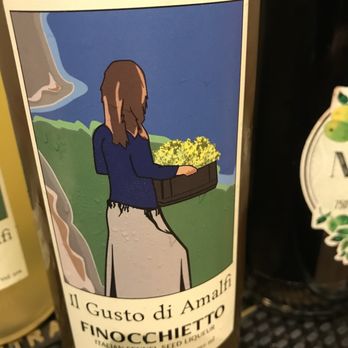 Healthy Spirits - a woman carrying a basket of grapes - Beer, Wine & Spirits Near Me - San Francisco, California