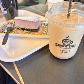 Sana'a Cafe - Ube cheesecake and Iced Sana'A Latte (with oat milk) - Cafes Near Me - Redwood City, California Sana'a Cafe - Ube cheesecake and Iced Sana'A Latte (with oat milk) - Cafes Near Me - Redwood City, California
