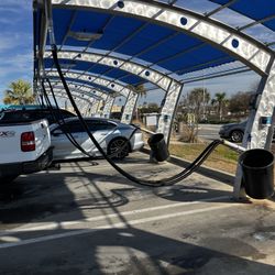 Rich's Car Wash - Car vacuums and trash cans conveniently located