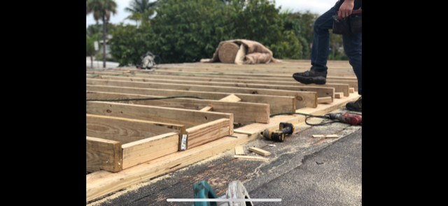 Slide of South Miami Roofing