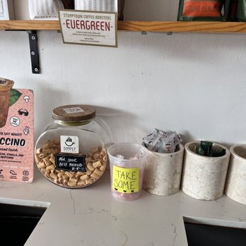Black Elephant Coffee - Burbank - Drink and food condiments and doggy treats in the glass container "woof woof!" - Coffee & Tea Near Me - Burbank, California