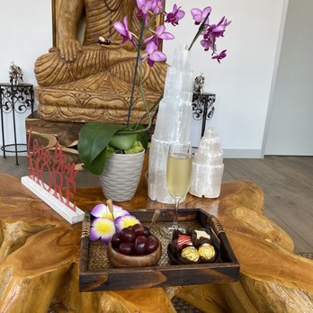 Nava De Massage - Cheese cake squares , Grapes , champagne. - Massage Therapy Near Me - Houston, Texas Nava De Massage - Cheese cake squares , Grapes , champagne. - Massage Therapy Near Me - Houston, Texas