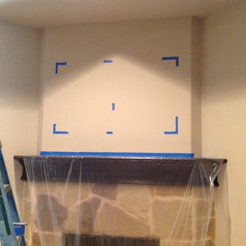 Mr. Electric of West Fort Worth - This happy homeowner needed an outlet installed so he could hang his TV over the mantle! - Electricians Near Me - Burleson, Texas Mr. Electric of West Fort Worth - This happy homeowner needed an outlet installed so he could hang his TV over the mantle! - Electricians Near Me - Burleson, Texas