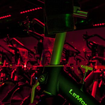 Revolve Cycling - (r)evolve = Lights down Low + Music up High - Cardio Classes Near Me - Tucson, Arizona