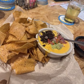 Rodeo Goat - TOSTADA CHIPS & QUESO; - Burgers Near Me - Frisco, Texas Rodeo Goat - TOSTADA CHIPS & QUESO; - Burgers Near Me - Frisco, Texas