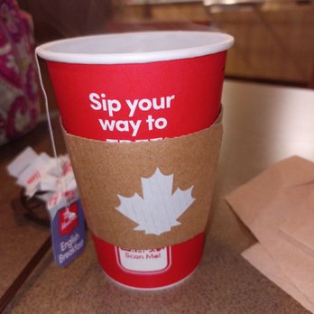 Tim Hortons - a cup of coffee on a table - Donuts Near Me - Morgantown, West Virginia Tim Hortons - a cup of coffee on a table - Donuts Near Me - Morgantown, West Virginia