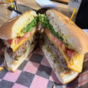 Ike's Korner Grille - A darn good burger!! A cheddar cheese burger with All the trimmings! - Bars Near Me - Spartanburg, South Carolina