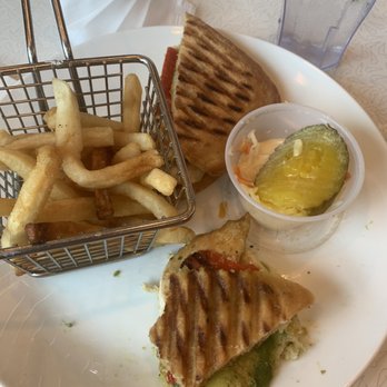 Daily Planet Diner - Fries and the chicken avocado panini. Portions were small and the fries weren't filled up all the way. - American Near Me - Lagrangeville, New York